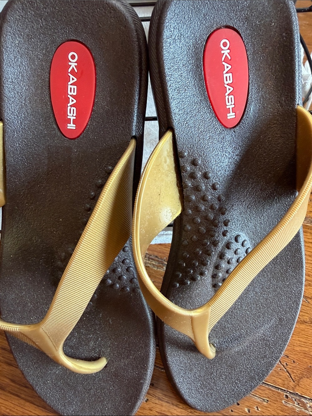 Okabashi Women’s Gold and Black Thong Sandals never worn.